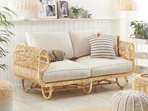 Rattanowa sofa 2-osobowa w bawełnianymi poduszkami naturalna plecionka Dolcedo Beliani
