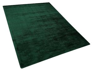 Nowoczesny dywan z wiskozy krótkie włosie prostokątny 140 x 200 cm ciemnozielony Gesi Beliani