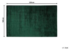 Nowoczesny dywan z wiskozy krótkie włosie prostokątny 160 x 230 cm ciemnozielony Gesi Beliani