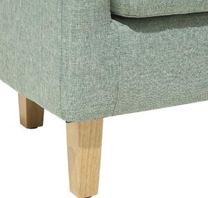 Fotel tapicerowany z podnóżkiem w stylu retro drewniane nóżki zielony Holden Beliani
