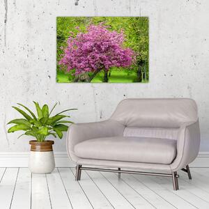 Obraz kwitnącego drzewa na łące (70x50 cm)