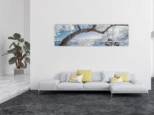 Obraz ośnieżonego drzewa nad wodą (170x50 cm)