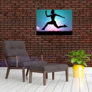 Obraz skaczącej sylwetki kobiety (70x50 cm)