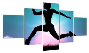 Obraz skaczącej sylwetki kobiety (125x70 cm)
