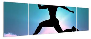 Obraz skaczącej sylwetki kobiety (170x50 cm)