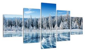 Obraz zamarzniętego jeziora i pokrytych śniegiem drzew (125x70 cm)