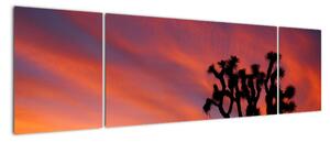 Obraz zachodu słońca nad sylwetką drzewa (170x50 cm)
