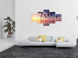 Obraz palm wznoszących się nad powierzchnią (125x70 cm)