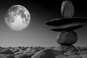 Obraz ułożone kamienie w świetle księżyca w wersji czarno-białej