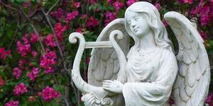 Obraz anioł grający na harfie