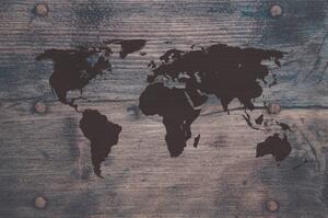 Tapeta mapa świata na ciemnym drewnie