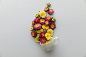 Fototapeta kubek pełen kwiatów