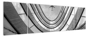 Obraz - Samolot nad budynkiem (170x50 cm)