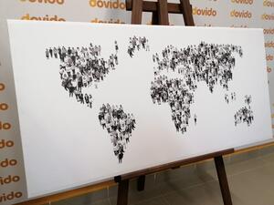 Obraz na korku mapa świata składająca się z ludzi w wersji czarno-białej