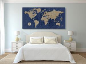 Obraz mapa świata z kompasem w stylu retro na niebieskim tle