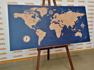 Obraz na korku mapa świata z kompasem w stylu retro na niebieskim tle