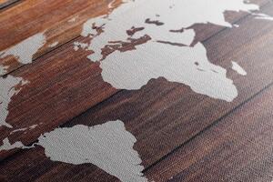 Obraz na korku mapa świata z drewnianym tłem
