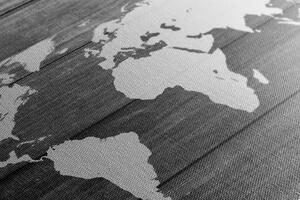 Obraz czarno-biała mapa świata z drewnianym tłem