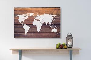 Obraz na korku mapa świata z drewnianym tłem