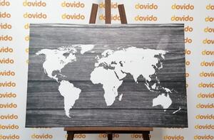 Obraz czarno-biała mapa świata z drewnianym tłem
