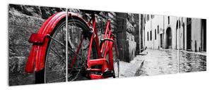 Obraz czerwonego roweru na brukowanej uliczce (170x50 cm)