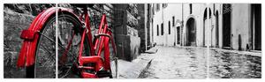 Obraz czerwonego roweru na brukowanej uliczce (170x50 cm)