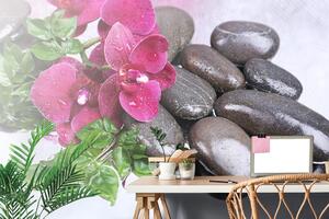 Samoprzylepna fototapeta kwitnąca orchidea i kamienie wellness