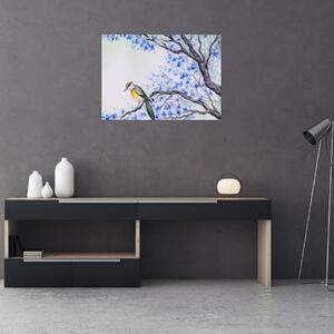 Obraz - ptak na drzewie z niebieskimi kwiatami (70x50 cm)