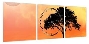 Obraz drzewa o zachodzie słońca (z zegarem) (90x30 cm)