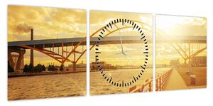 Obraz mostu z zachodem słońca (z zegarem) (90x30 cm)