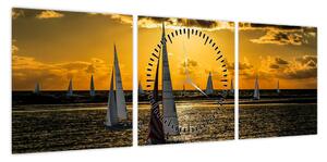 Obraz jachtu o zachodzie słońca (z zegarem) (90x30 cm)