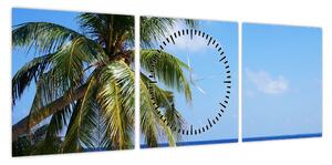 Obraz palmy na plaży (z zegarem) (90x30 cm)