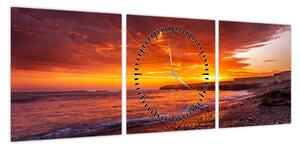 Obraz zachodu słońca nad morzem (z zegarem) (90x30 cm)