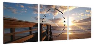 Obraz molo, plaży i morza (z zegarem) (90x30 cm)