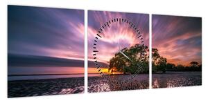Obraz plaży o zachodzie słońca (z zegarem) (90x30 cm)