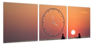 Obraz kajakarzy o zachodzie słońca (z zegarem) (90x30 cm)