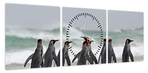 Obraz pingwinów nad oceanem (z zegarem) (90x30 cm)