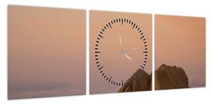Obraz zachodu słońca w skałach (z zegarem) (90x30 cm)