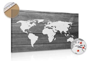 Obraz na korku czarno-biała mapa świata z drewnianym tłem