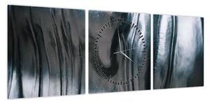 Obraz - Twarz ze stali (z zegarem) (90x30 cm)