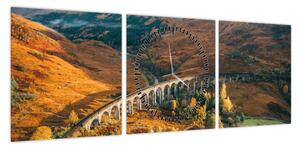 Obraz mostu w szkockiej dolinie (z zegarem) (90x30 cm)