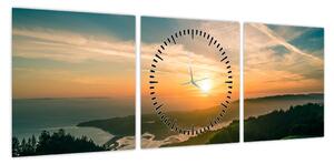 Obraz wschodu słońca nad morzem (z zegarem) (90x30 cm)