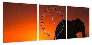 Obraz słonia o zachodzie słońca (z zegarem) (90x30 cm)