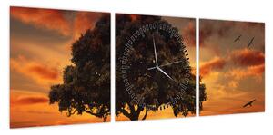 Obraz drzewa o zachodzie słońca (z zegarem) (90x30 cm)