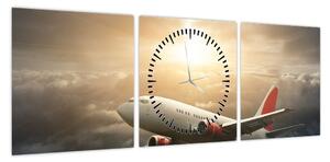 Obraz - Samolot w chmurach (z zegarem) (90x30 cm)