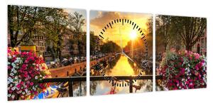 Obraz - Wschód słońca w Amsterdamie (z zegarem) (90x30 cm)