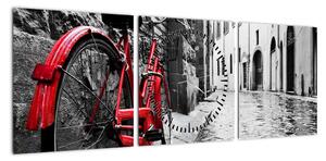 Obraz czerwonego roweru na brukowanej uliczce (z zegarem) (90x30 cm)