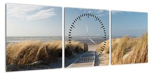 Obraz - Piaszczysta plaża na wyspie Langeoog, Niemcy (z zegarem) (90x30 cm)
