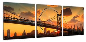 Obraz - Zachód słońca nad mostem Bena Franklina, Filadelfia (z zegarem) (90x30 cm)