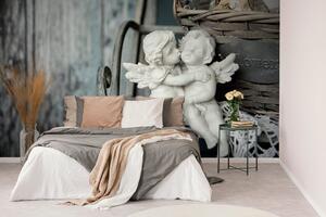 Samoprzylepna fototapeta statuetki aniołów na ławce